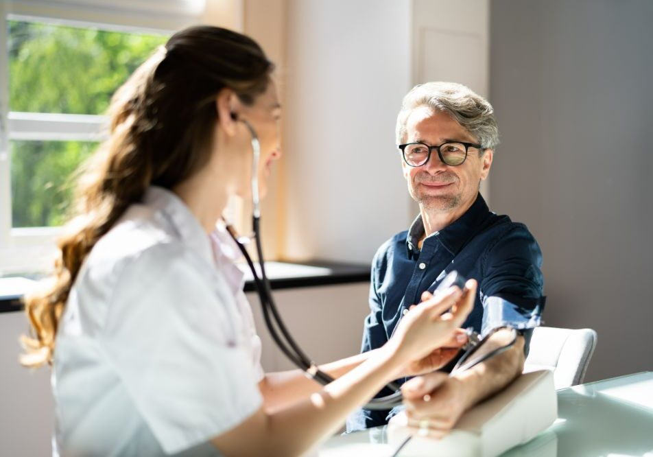 AdobeStock_442937999 (1) Healthcare, patient and doctor doing a wellness physical