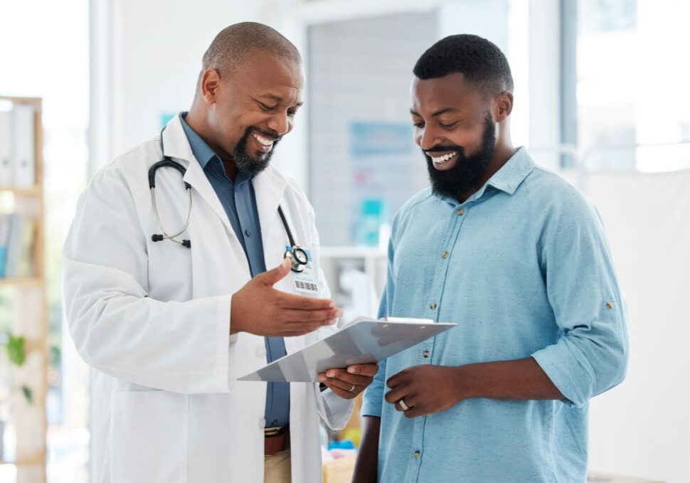 AdobeStock_588722037 (1) Healthcare, patient and doctor doing a wellness physical